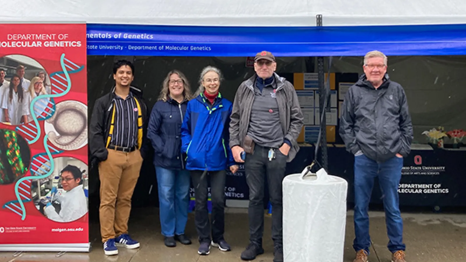 Molecular Genetics Volunteers are cheerful despite the rain!