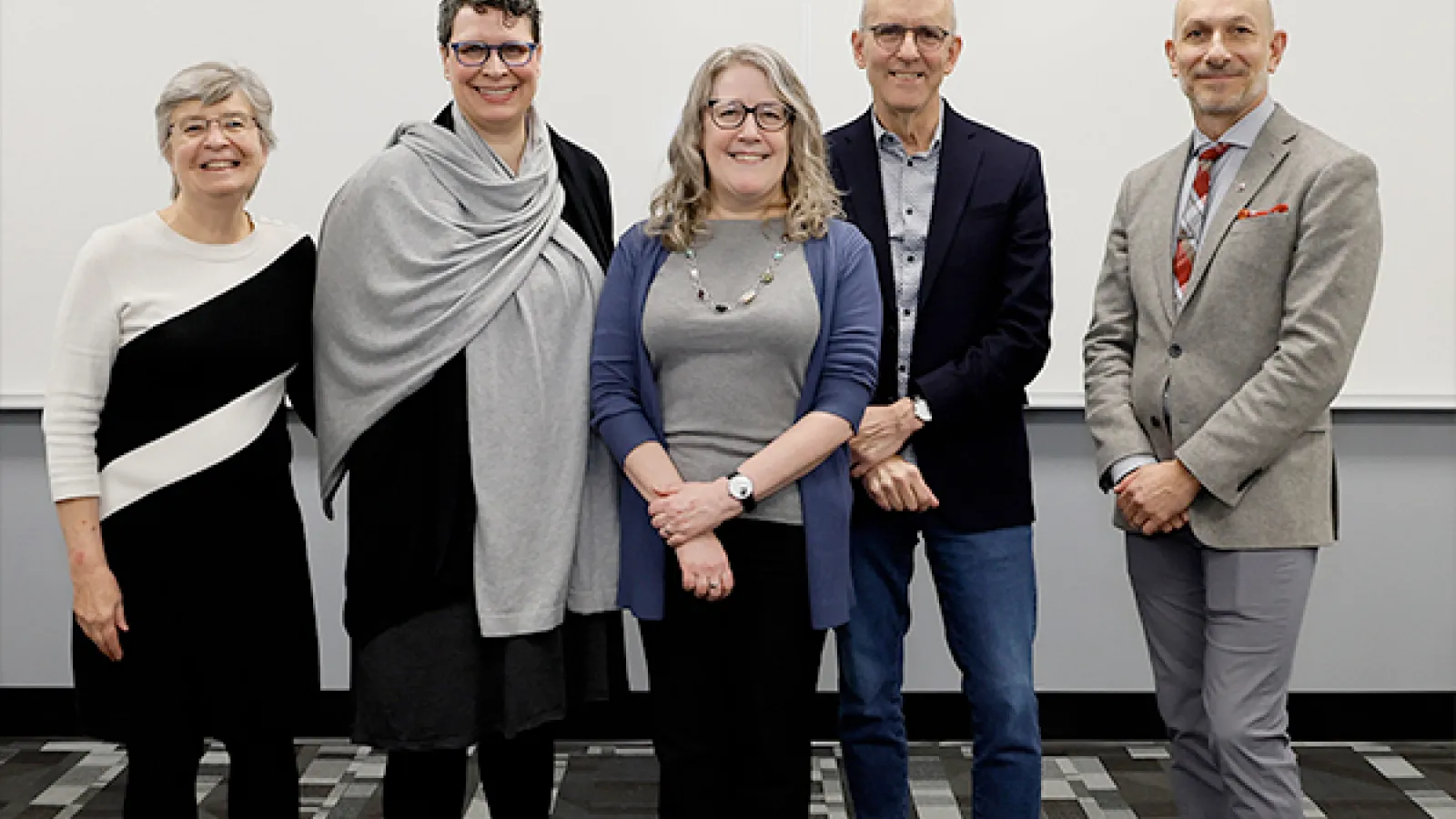 Susan Cole (center) with administrators