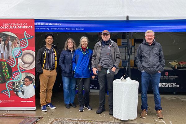Molecular Genetics Volunteers are cheerful despite the rain!