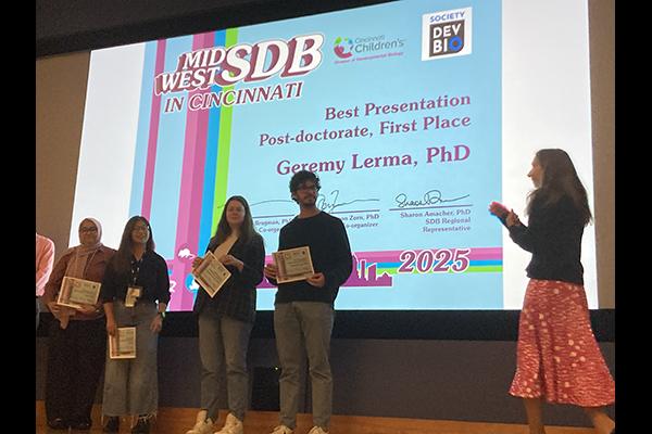 Geremy Lerma receiving his prize. Geremy is the second from the right in the picture.