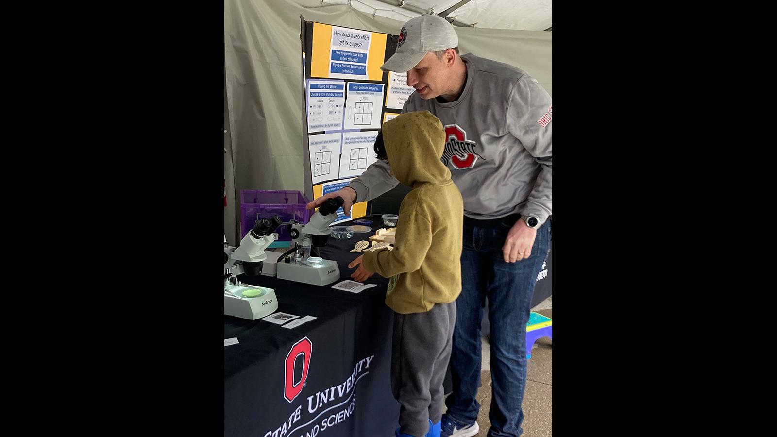visitors engaging in FUNdanmentals of Genetics