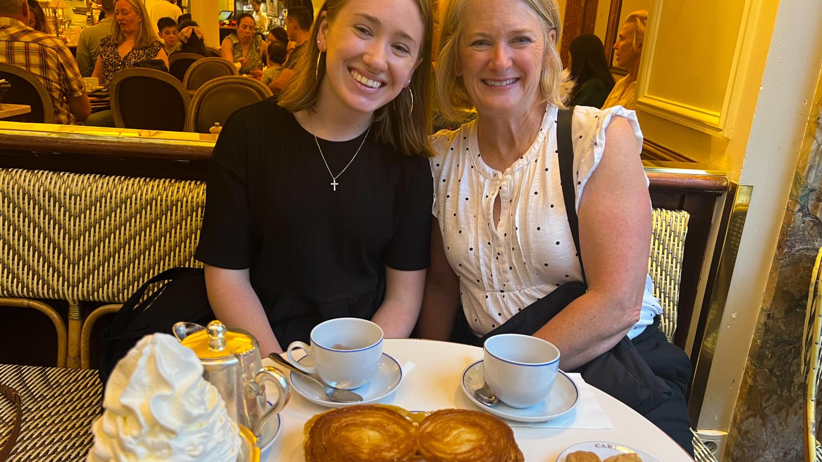 Emily Raiff with her host mother Elizabeth Husson enjoying Parisian pastries and coffee